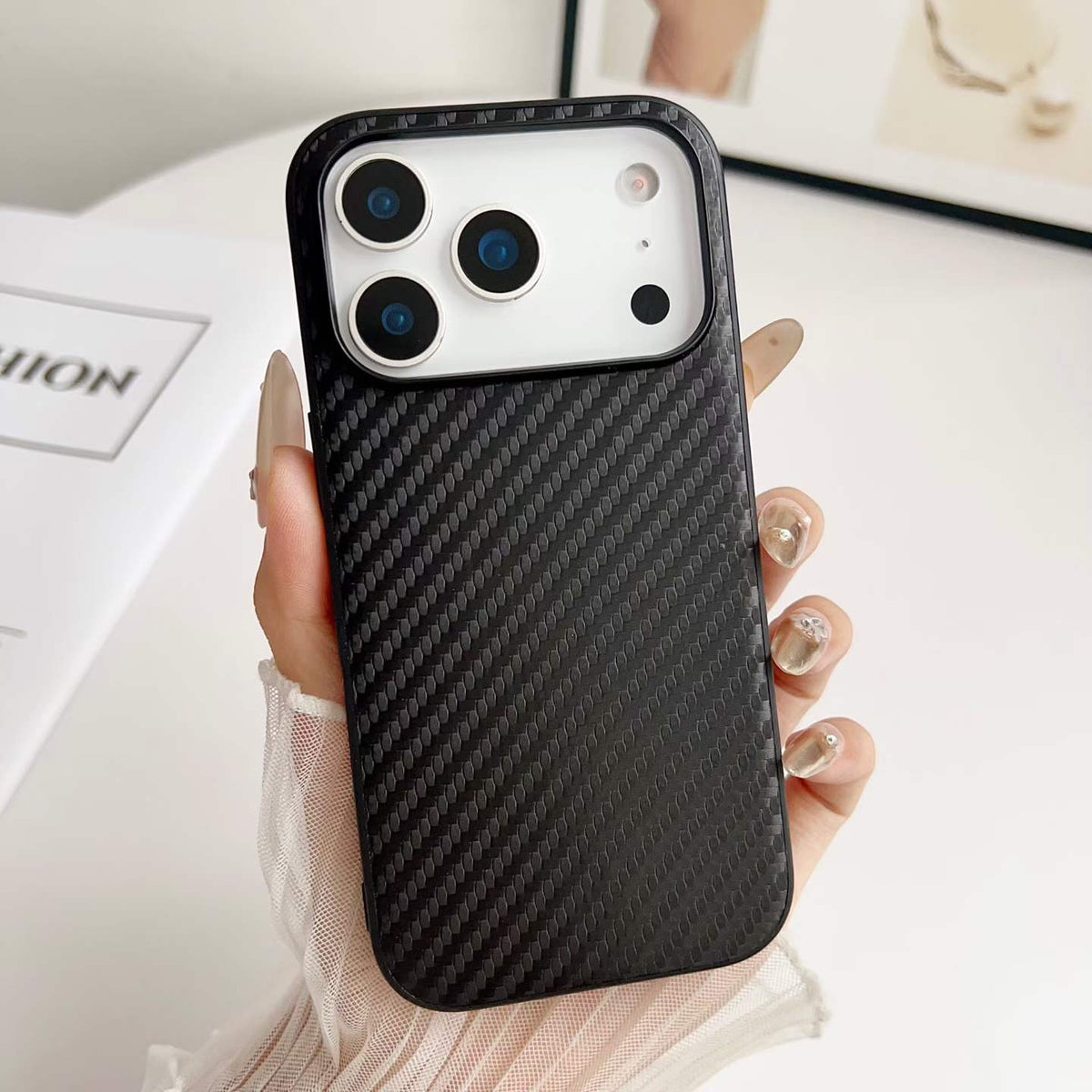 Black Carbon-Look PU Phone Case - hand-held texture detail, iPhone shown