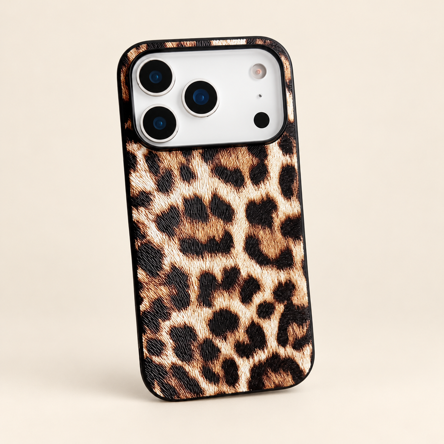 Leopard print PU phone case, clean rear view showing the embossed texture and camera edge; iPhone version pictured