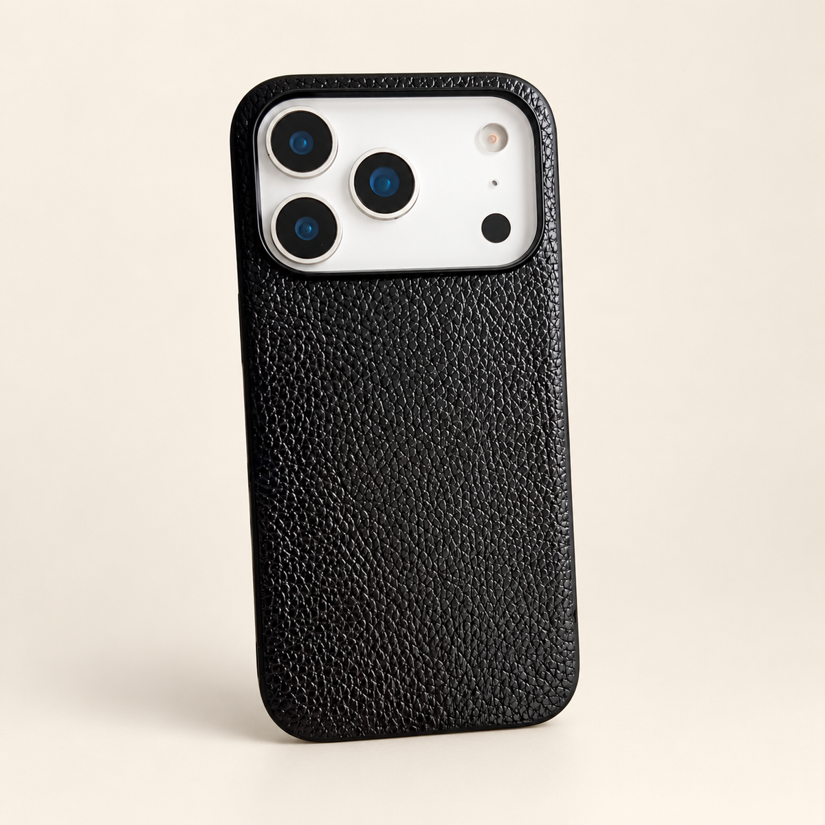 Black pebbled-grain PU phone case, clean rear view showing the textured finish and camera edge; iPhone version pictured