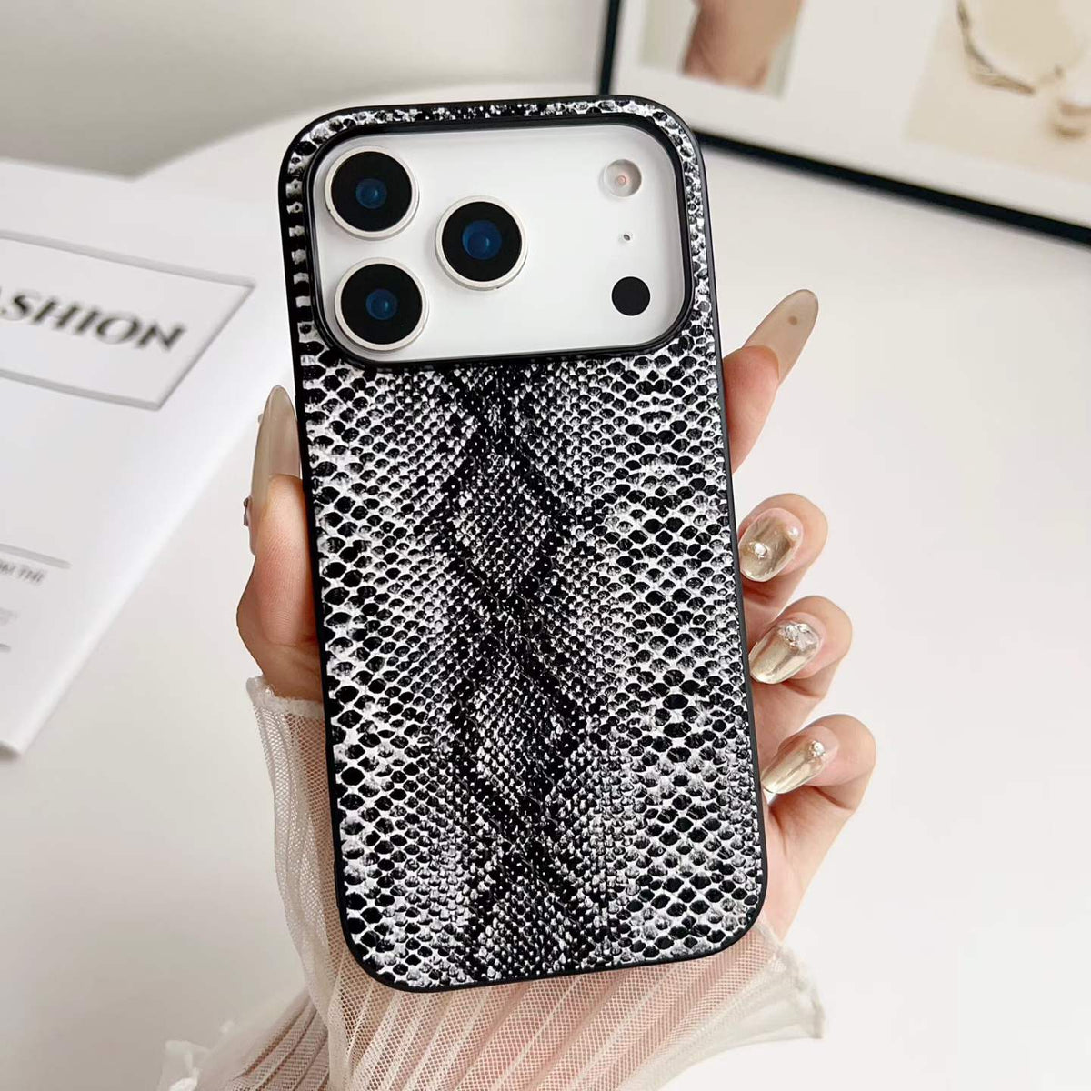 Dark Snakeskin Print PU Phone Case - hand-held texture detail, iPhone shown