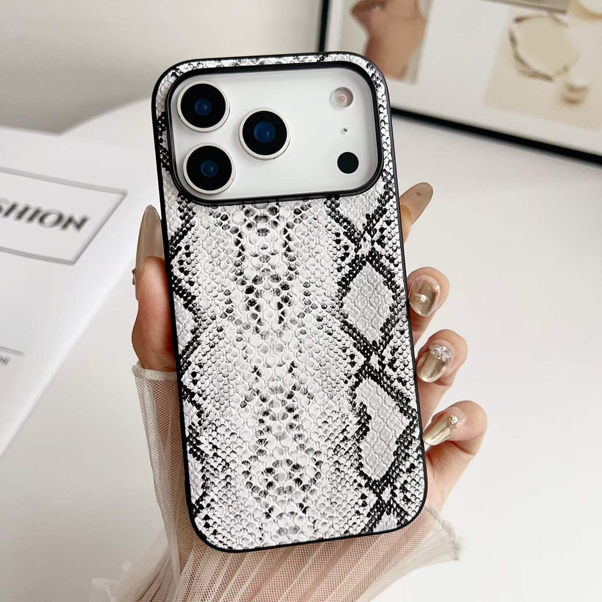 Light Snakeskin Print PU Phone Case - hand-held texture detail, iPhone shown